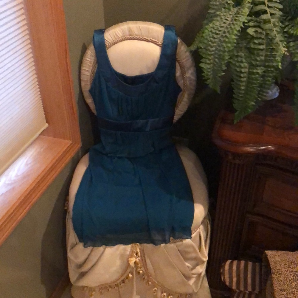 Teal chiffon dress with side zipper, tie back.